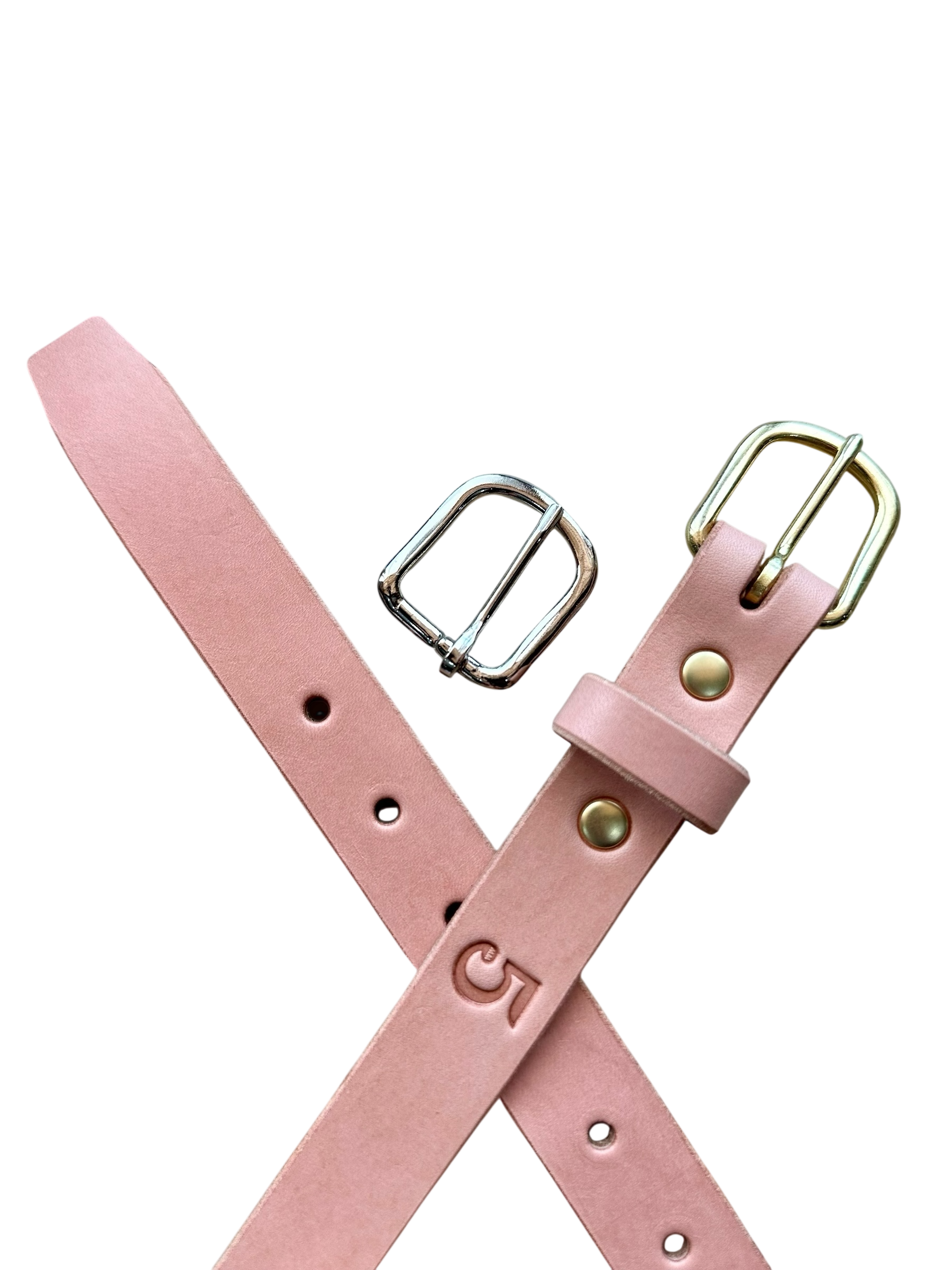 Pink leather belt with gold buckle on a white background