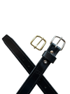 Black leather belt with gold and silver buckles on a white background