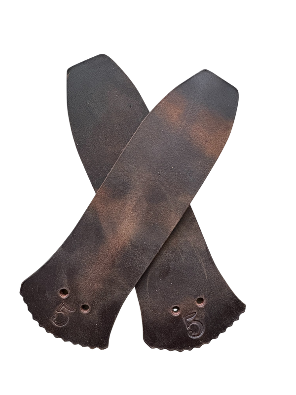 Pair of Dirty Dark Brown Colored Blue Collar Boot Kilities no background