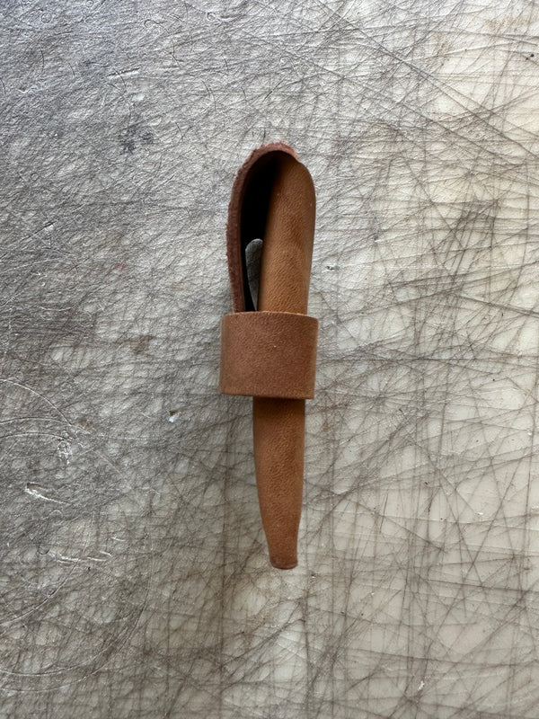 Pocket wallet with flap Brown flap open side view on cutting table
