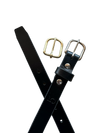 Black leather belt with gold and silver buckles on a white background