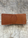 3 pocket bifold wallet Coffee color on cutting table