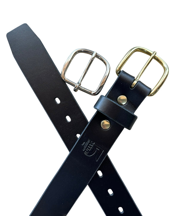 Black leather belt with gold and silver buckles on a white background