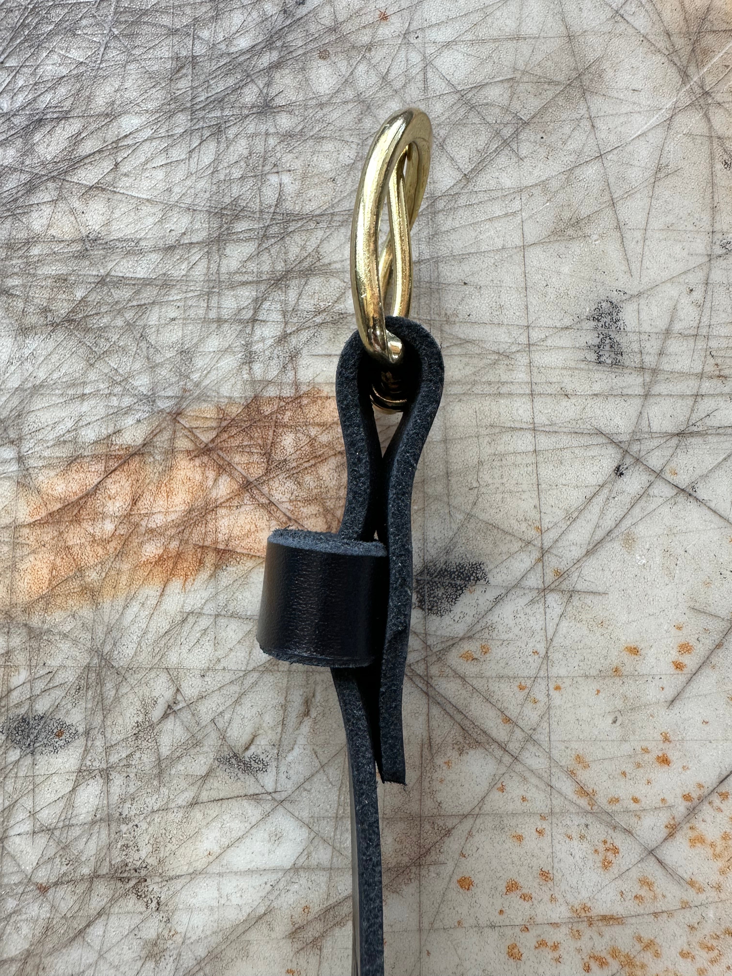 5 Miler Belt Black Satin Side View on Cutting Table