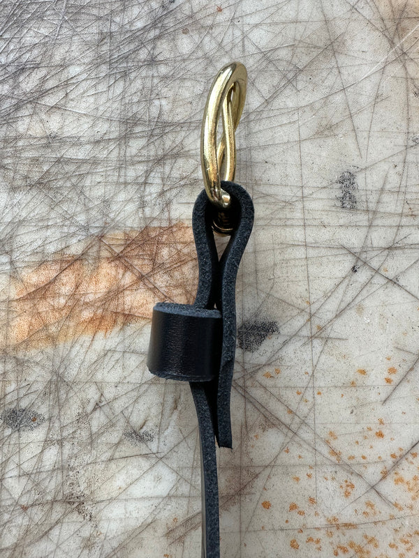 5 Miler Belt Black Satin Side View on Cutting Table