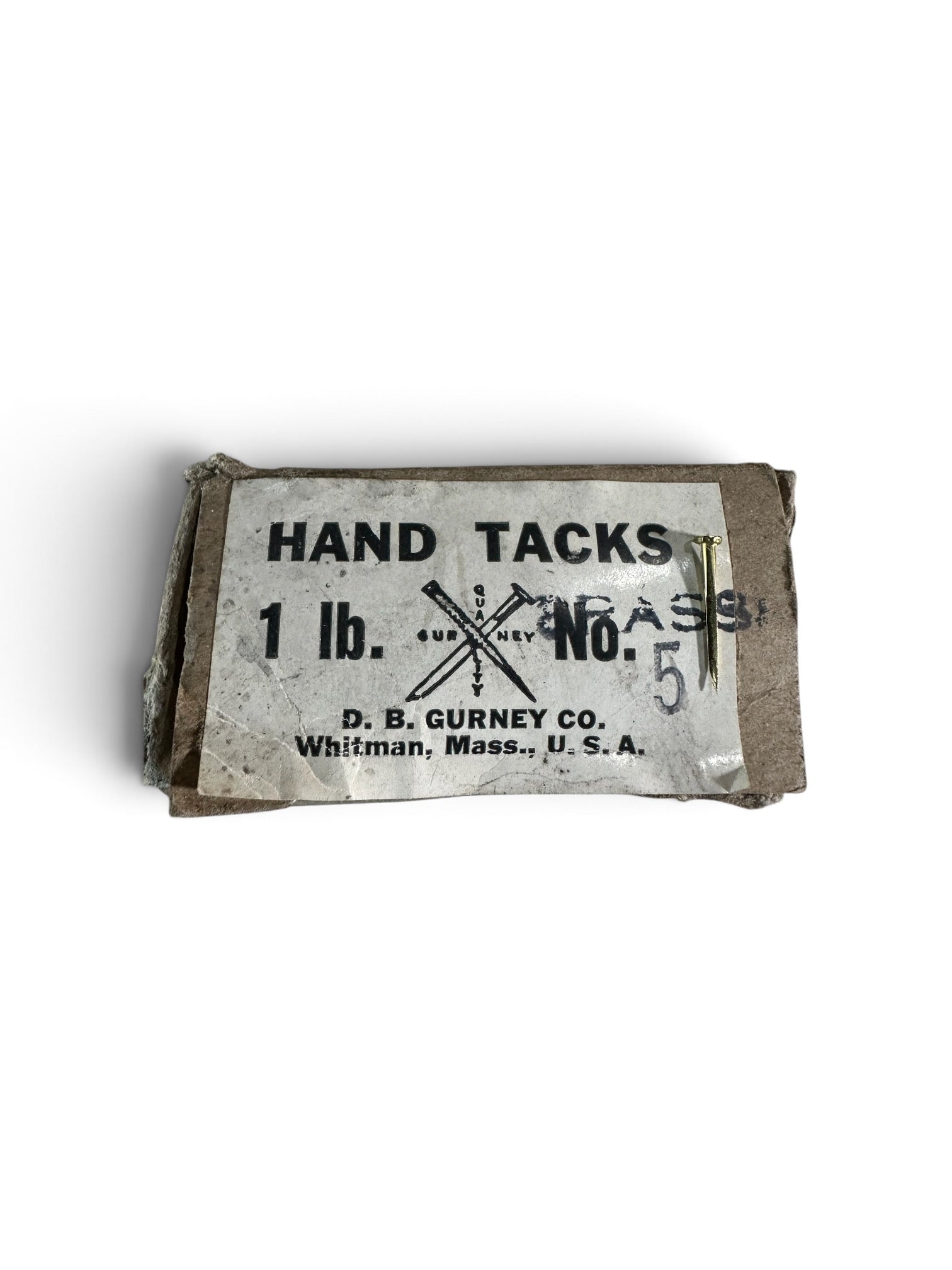 A small rectangular package of hand tacks with a worn paper label reading 'HAND TACKS 1 lb. No.