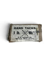 A small rectangular package of hand tacks with a worn paper label reading 'HAND TACKS 1 lb. No.