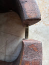 Antique hat stretcher zoomed in on brass scale