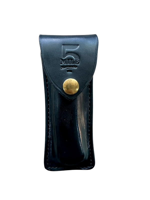 Buck 110 Vintage Replica leather knife sheath with brass fasteners on a white background flap closed
