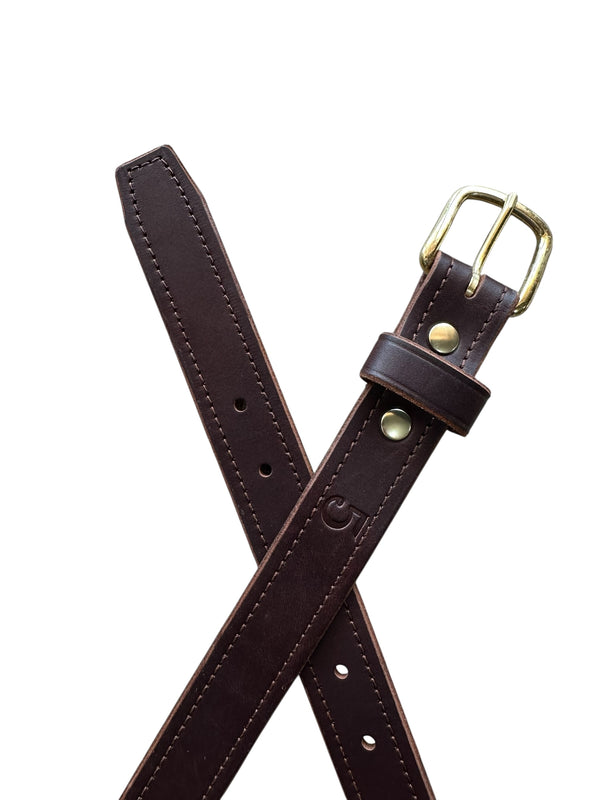 Brown leather belt with brass buckle on a white background