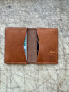 Folding card wallet Coffee color open on cutting table