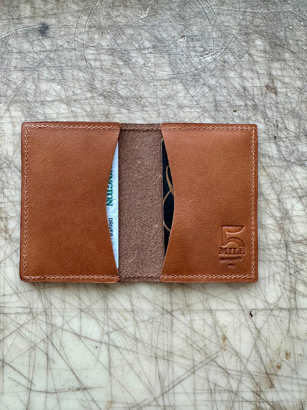 Folding card wallet Coffee color open on cutting table