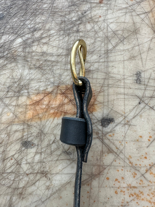 Granger Belt Matte Black Side Profile on Cutting Table
