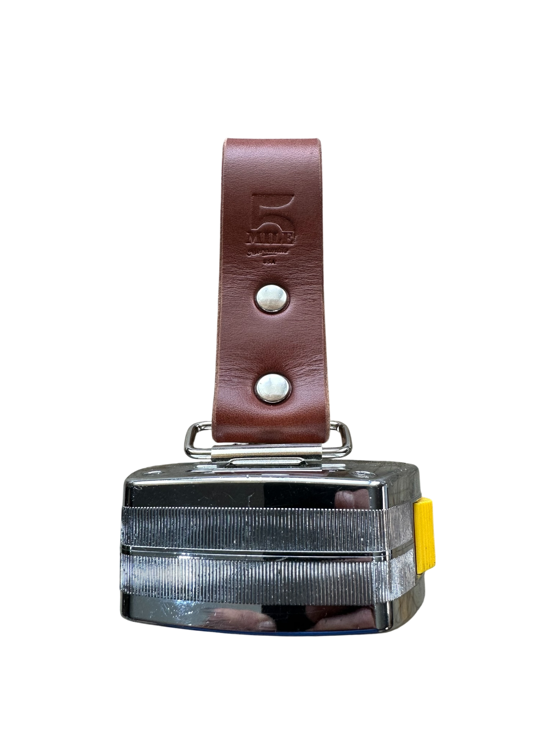 Brown leather strap holding measuring tape