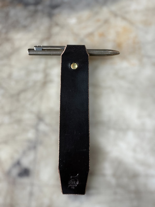 Leather bookmark brown waxed flesh on cutting table
