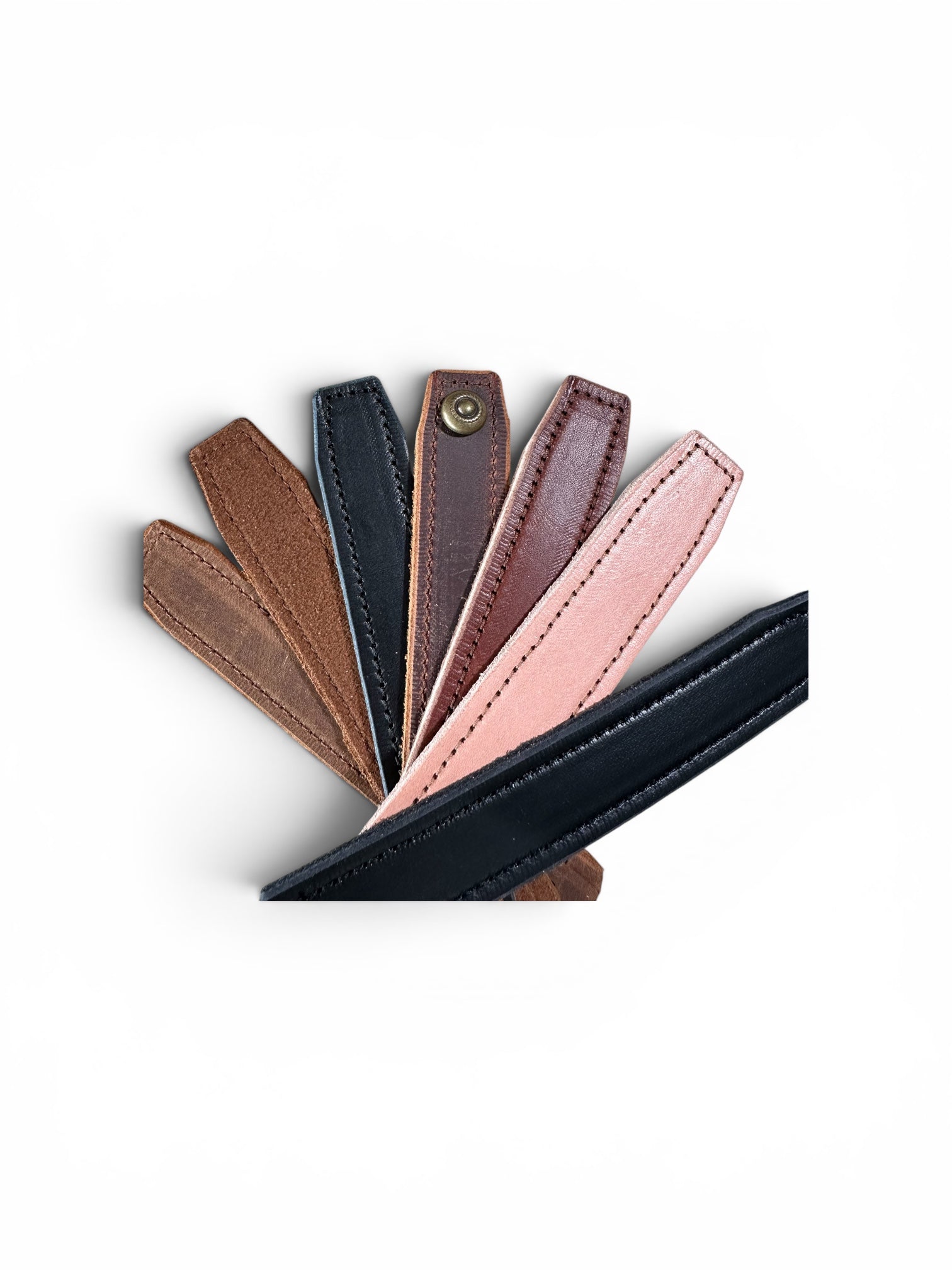 Six leather strap samples in various colors including brown, black, tan, burgundy, pink, and dark navy, fanned out on a white background.