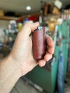 Leather lighter sheath held in hand