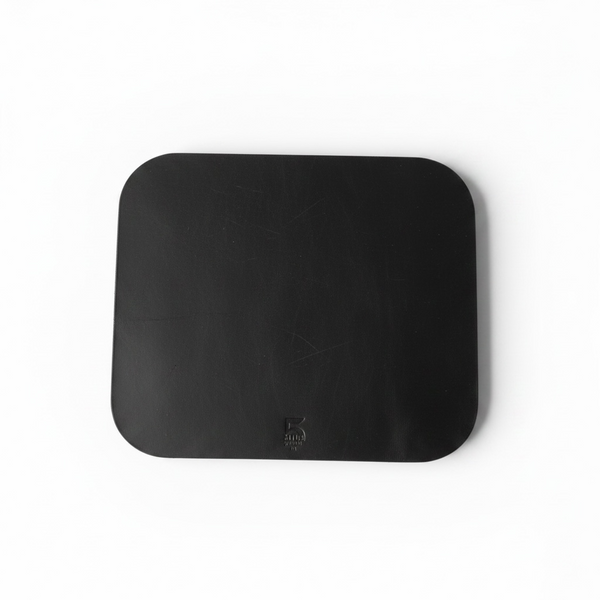 Black square mouse pad on a white background