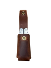 Brown leather case with a silver knife inside on a white background