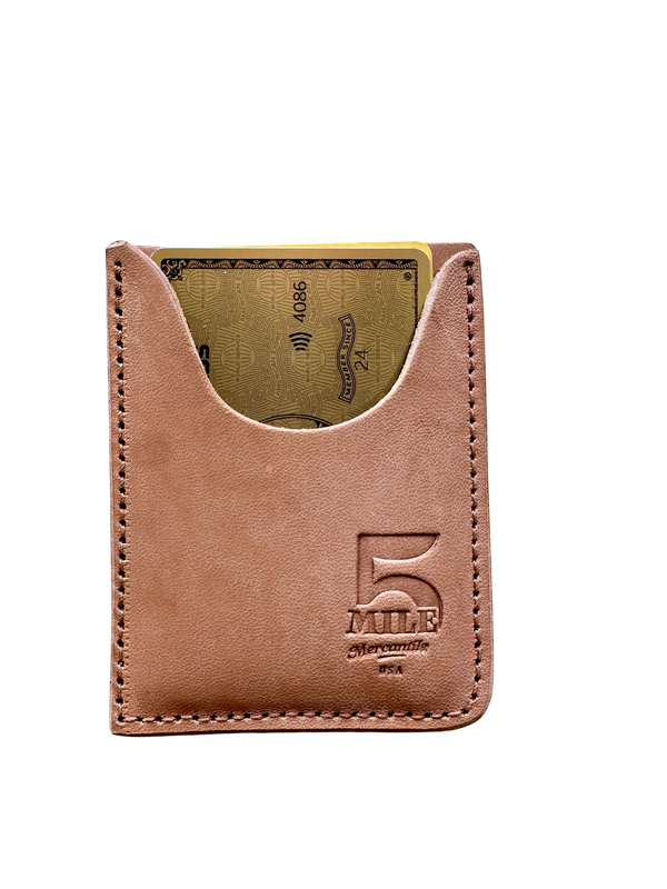 Brown leather wallet with card holder on a white background