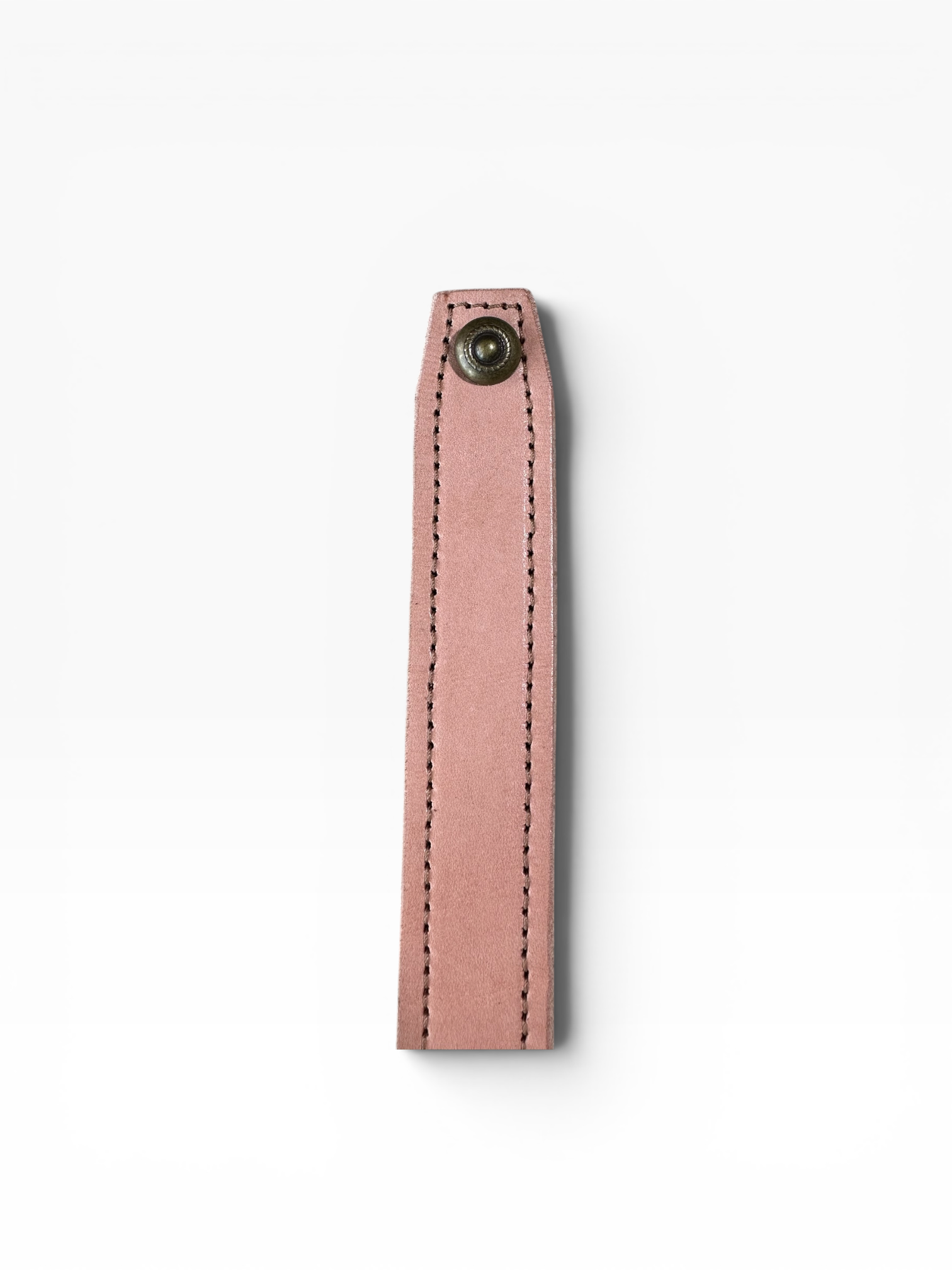 A slim, dusty pink leather strap with black contrast stitching and a dark metal snap button, shown vertically on a clean white background.