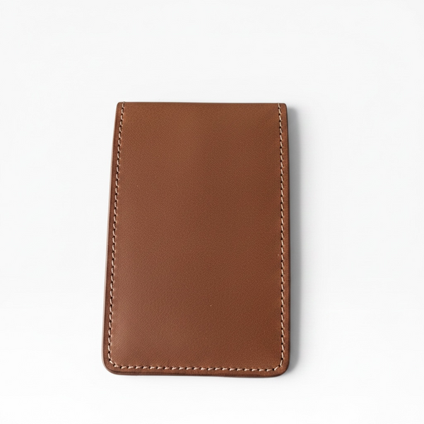 Louis Vuitton wallet with monogram pattern on a white background