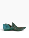 A single vintage wooden shoe tree with a distressed teal-green patina finish, shown from a side profile against a plain white background.