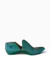 Green loafer shoe on a white background