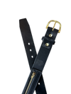 Black leather belt with gold hardware on a white background