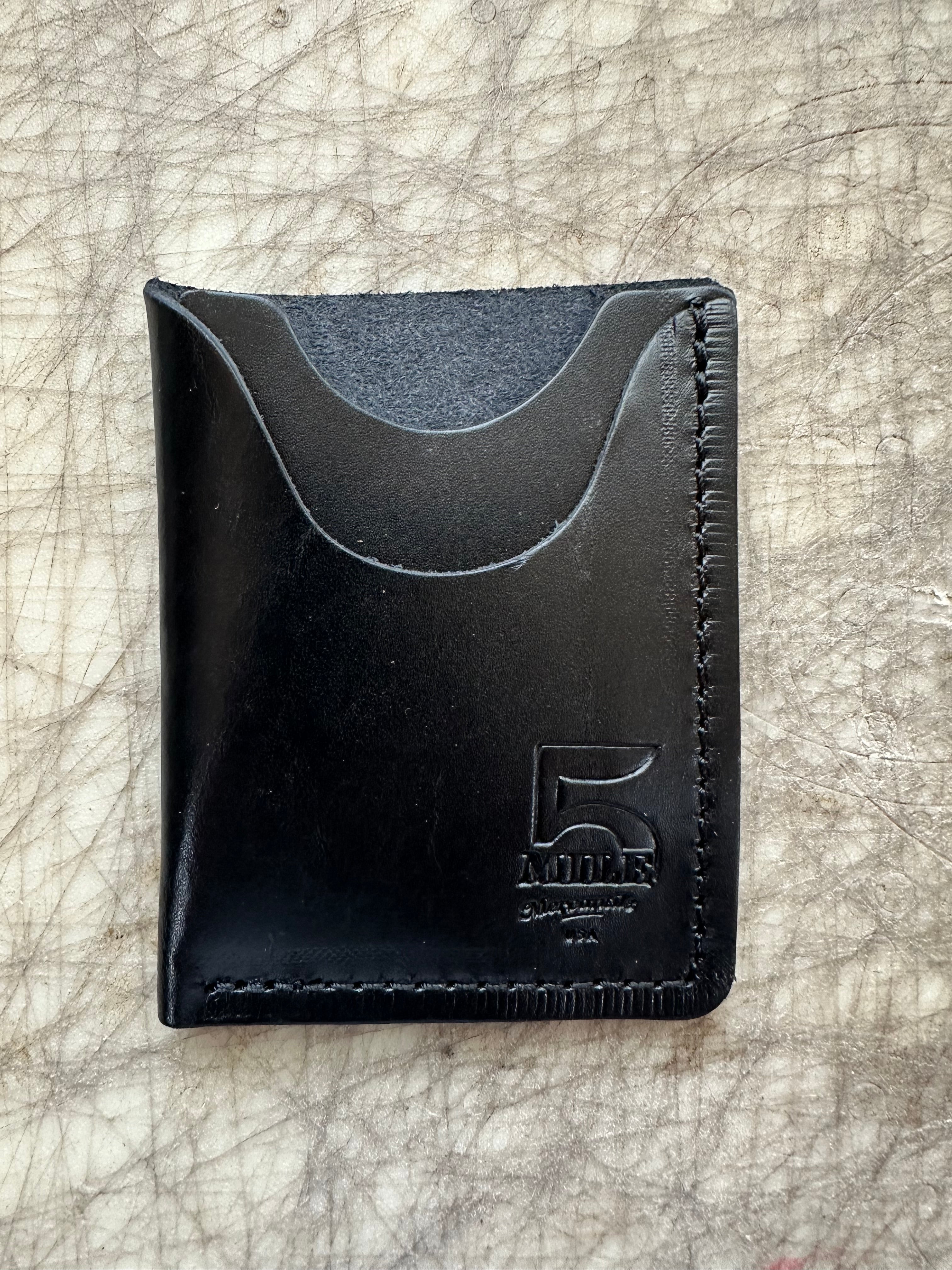 Vertical Card Wallet Black on cutting table