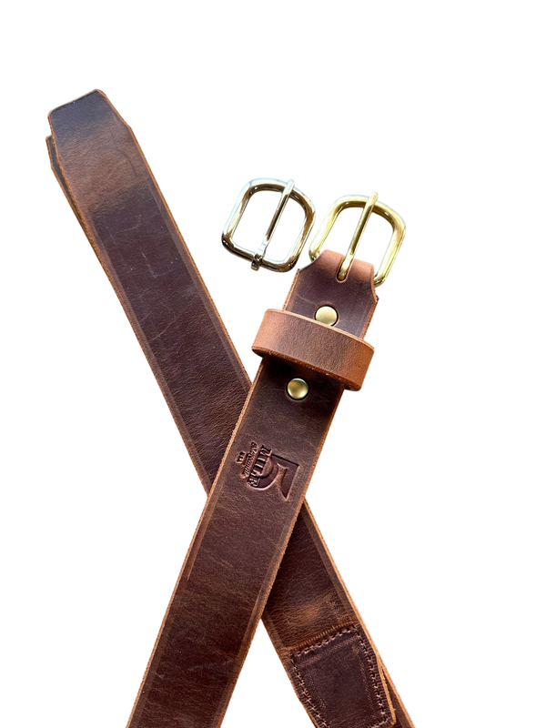 Brown leather belt with brass buckle on a white background