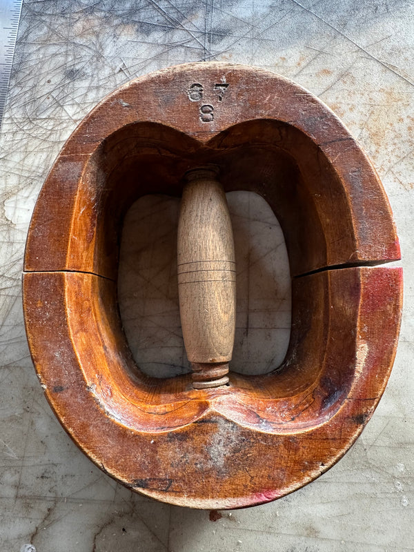 Wooden hat stretcher with numbers for sizing